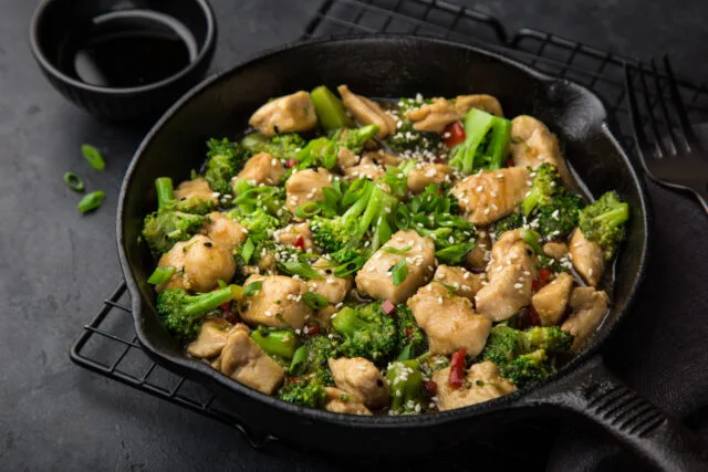 Teriyaki,Chicken,And,Broccoli,In,Cast,Iron,Pan,,Selective,Focus, Teriyaki,Chicken,And,Broccoli,In,Cast,Iron,Pan,,Selective,Focus,